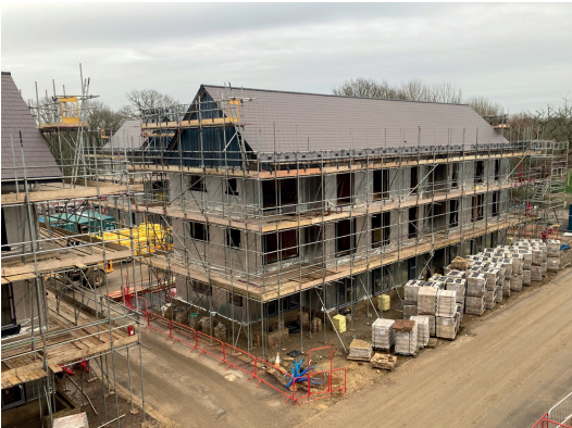 An image showing a house under construction at the Freeks Farm site